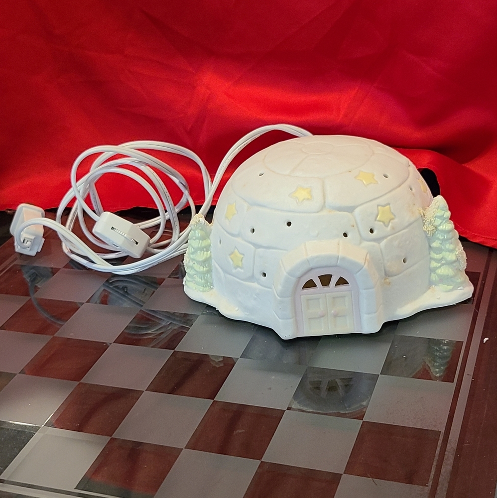 Icy Igloo plug in light up figurine for your snowbaby collection .
